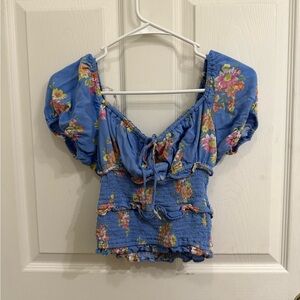 Juniors size small SO blue floral puffed sleeves top with bow on front